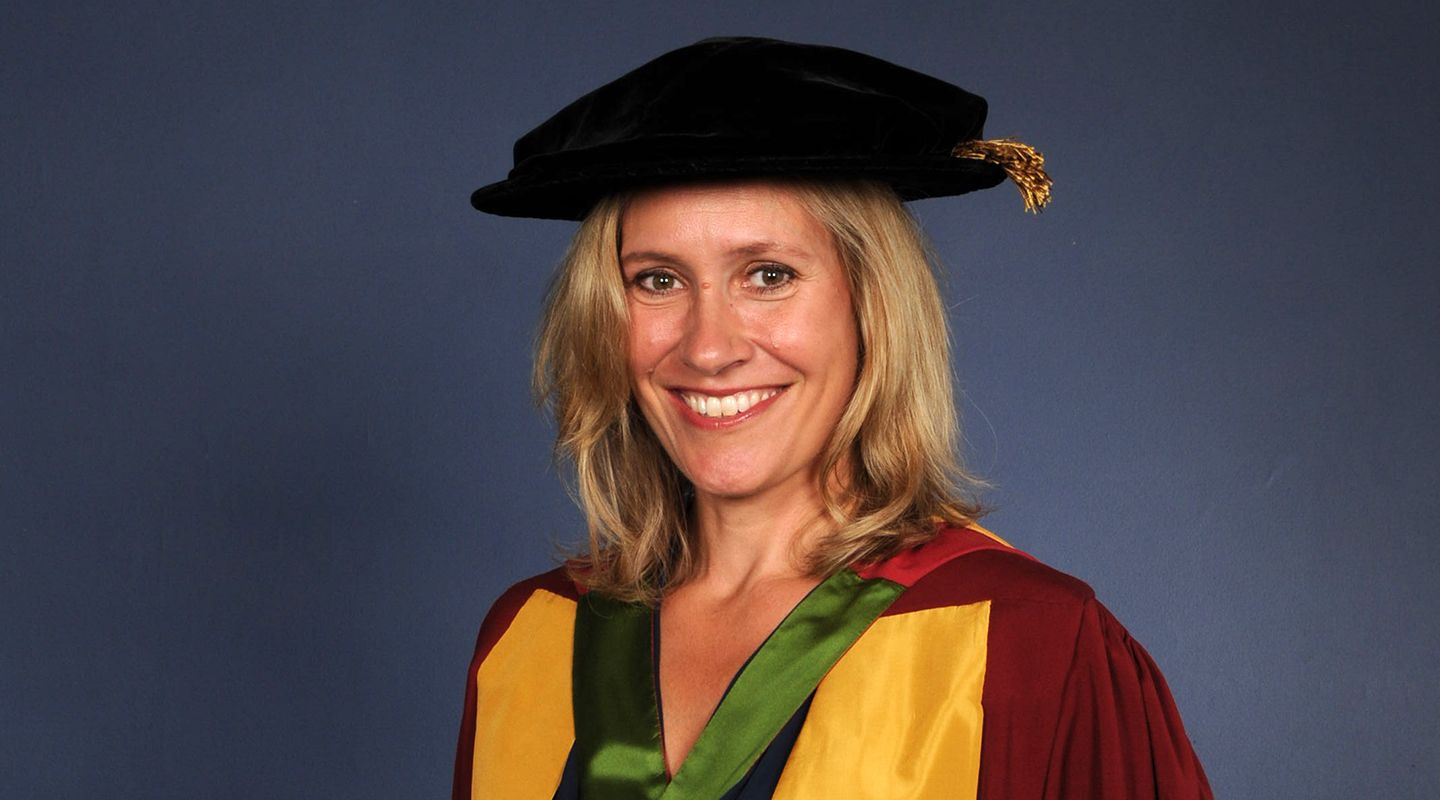 Sophie Raworth, a young white woman with shoulder length blonde hair wearing a cap and robes for her graduation ceremony.