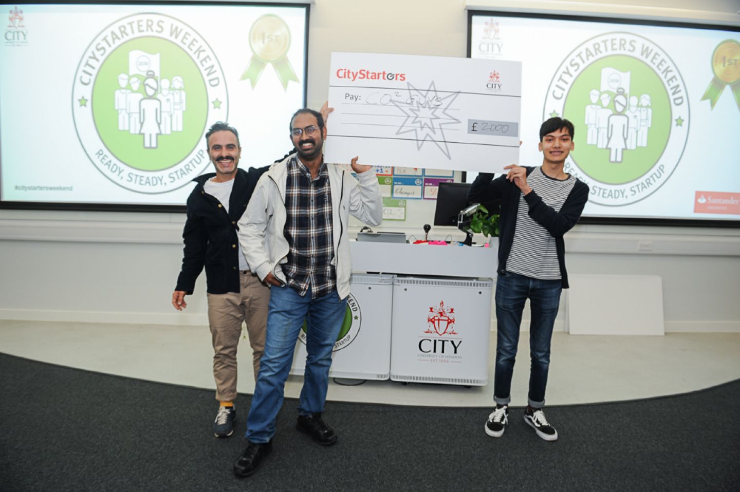 CO2 Guys team holding their CityStarters cheque presented by Antony Noun