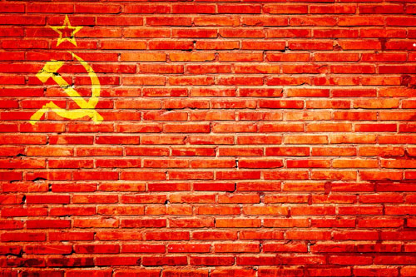 Soviet flag on brick wall