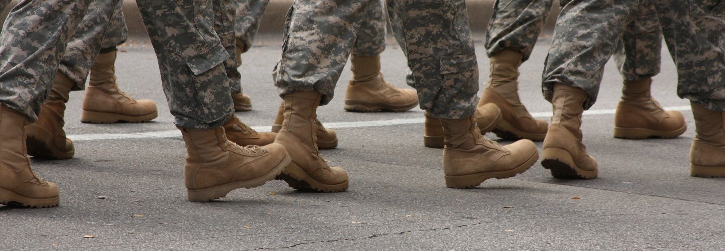 Military trainees walking in boots