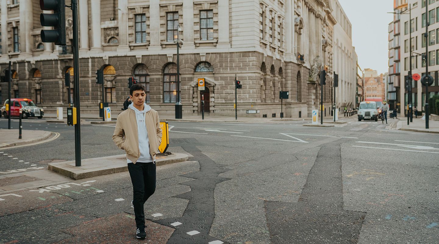 City student walking through London