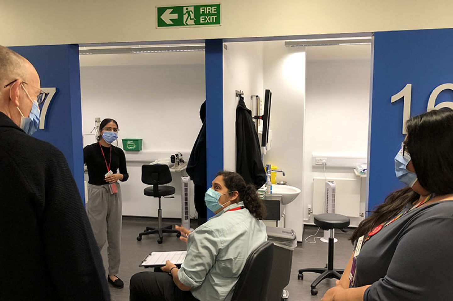 Professor Sir Anthony Finkelstein speaking to a teaching optometrist on his tour of City Sight
