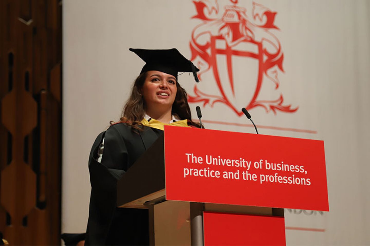 Student speaker Elena de Ficchy addresses her fellow students at her graduation ceremony in the Barbican Centre