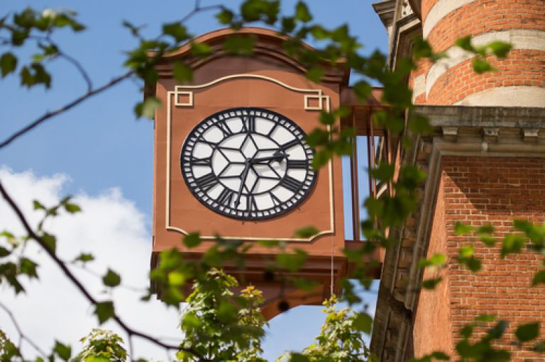 Image of the clock tower on College Building