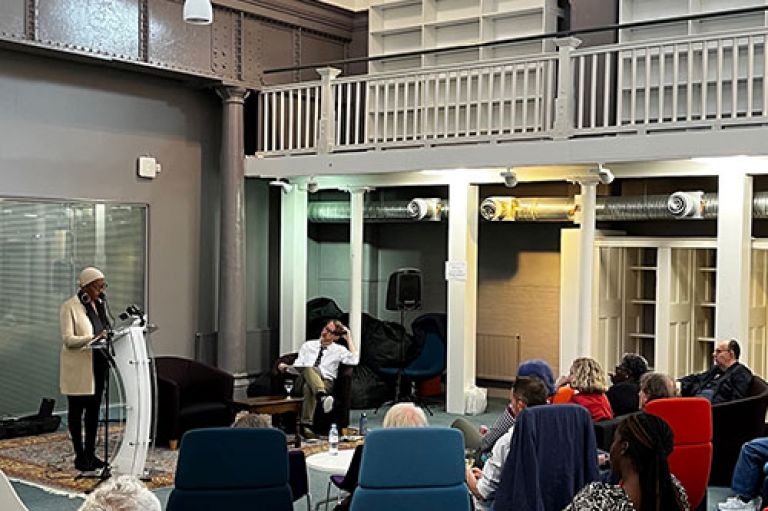 Poet Esther Phillips performs at the Pool space in College Building