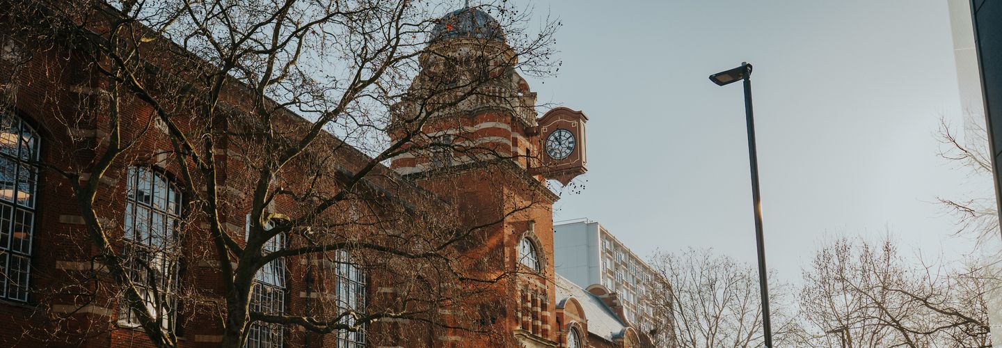 Image of the clock tower on College Building