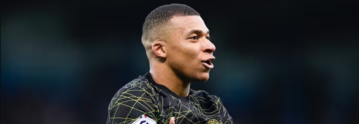 Kylian Mbappe performing his characteristic pose