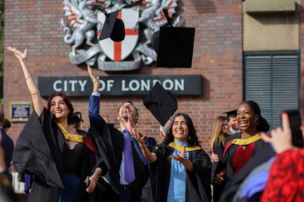 City graduates celebrate at the first in-person graduation in almost two years
