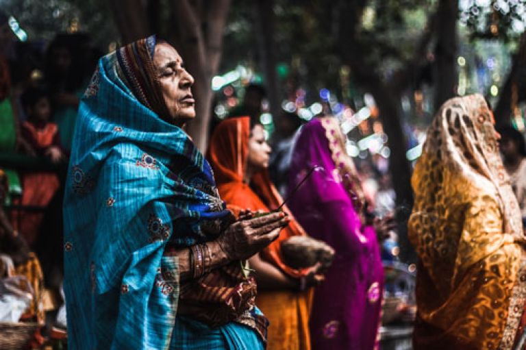 Women praying in India