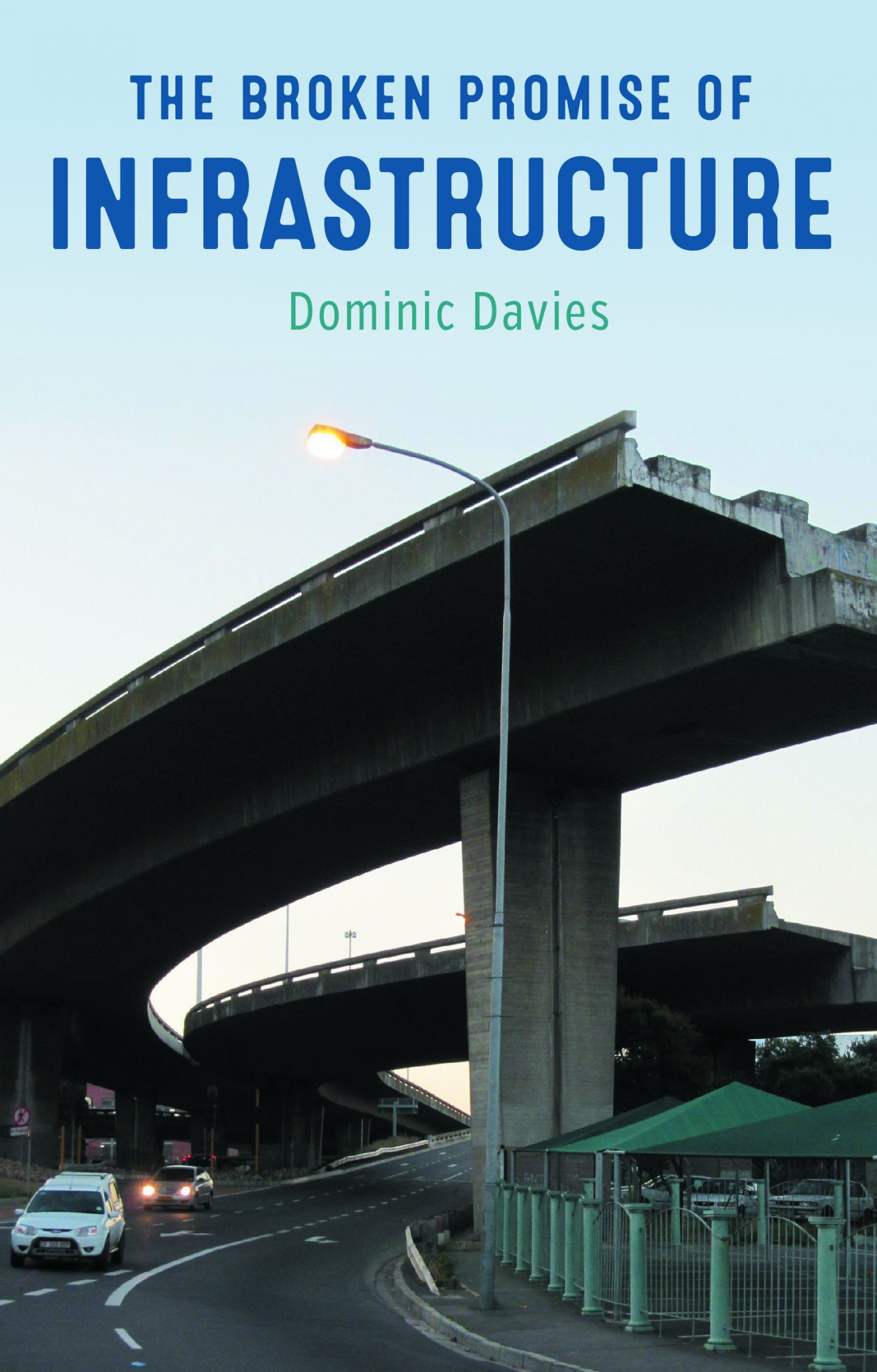 Picture of the cover of Dr Dom Davies' book The Broken Promise of Infrastructure. The image is of a the Foreshore Freeway Bridge, which is an unfinished motorway bridge in Cape Town, South Africa,