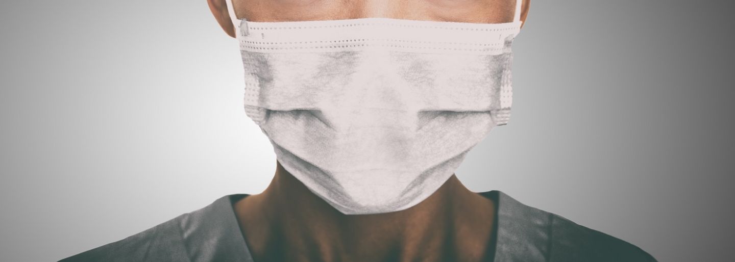 Face of a female nurse wearing a protective mask