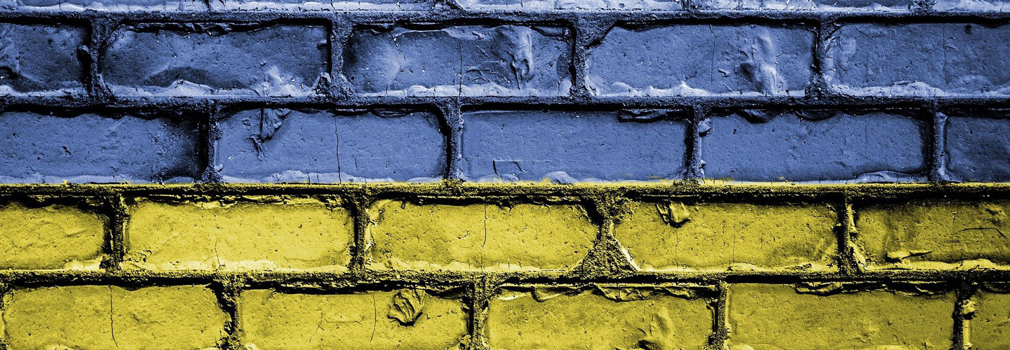 Ukrainian flag on rustic bricks