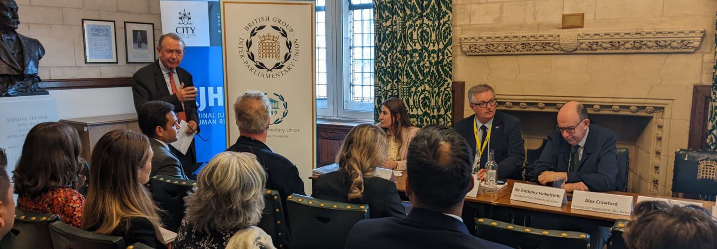 APPG with Lord Alton speaking banner