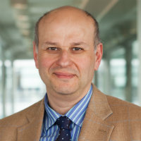 Photo of Professor Michael Tamvakis
