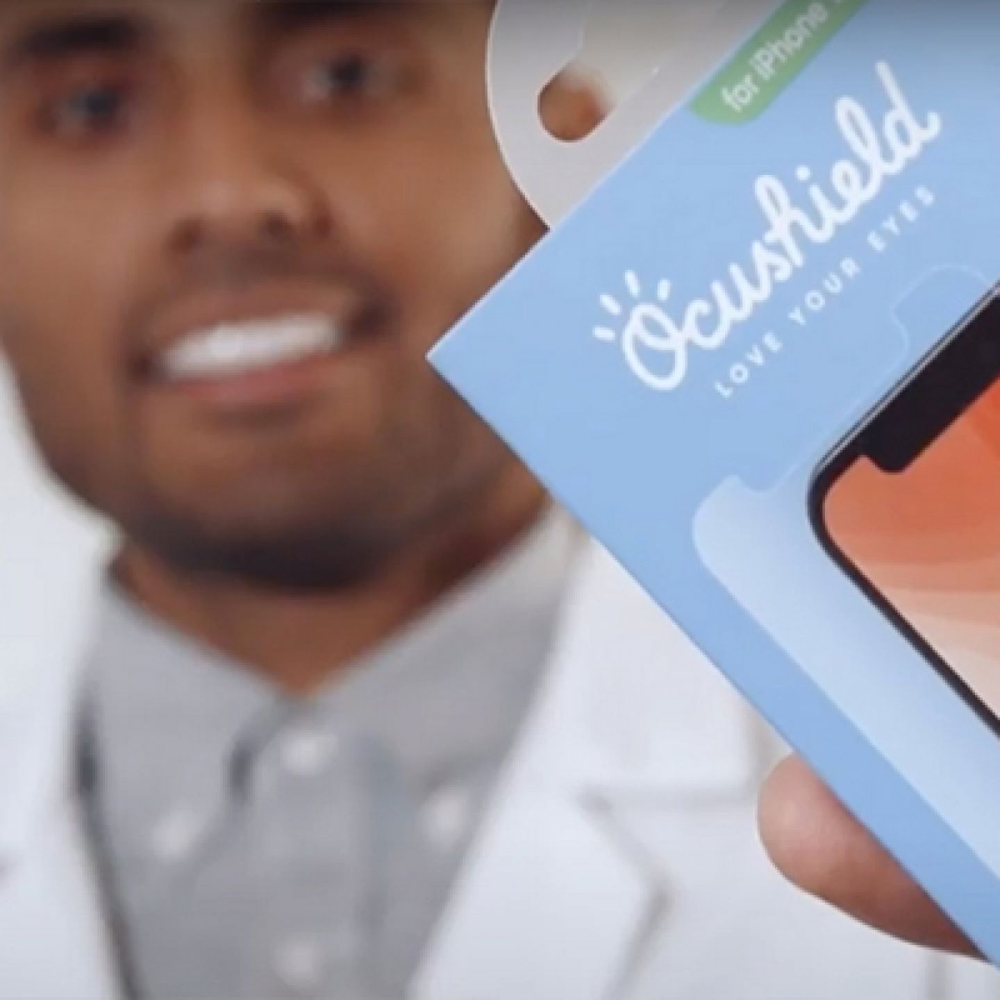 Dhruvin Patel holding Ocushield screen protector packaging 