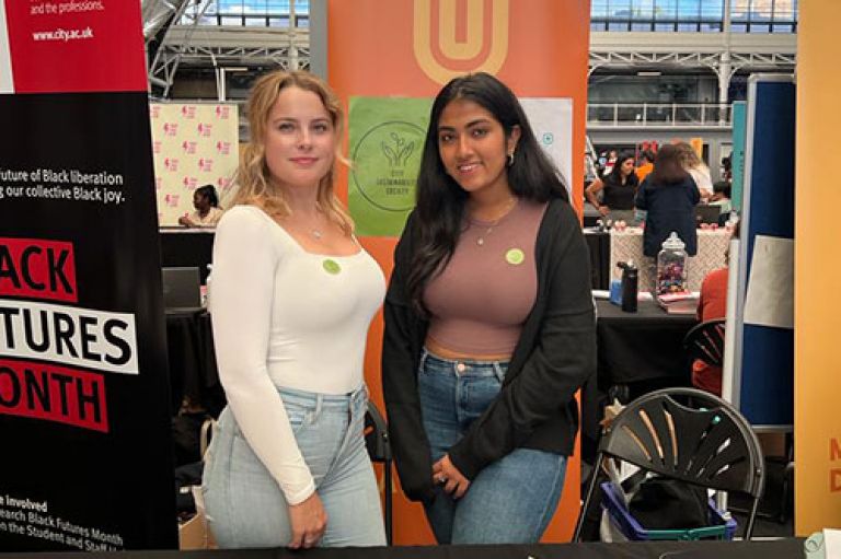 City Sustainability Society Co-Presidents at the Student Society Fair in Welcome Week. Left: Danielle Arbeiter (LLB in Law). Right: Ananya Pahwa (BSc in Business Management)