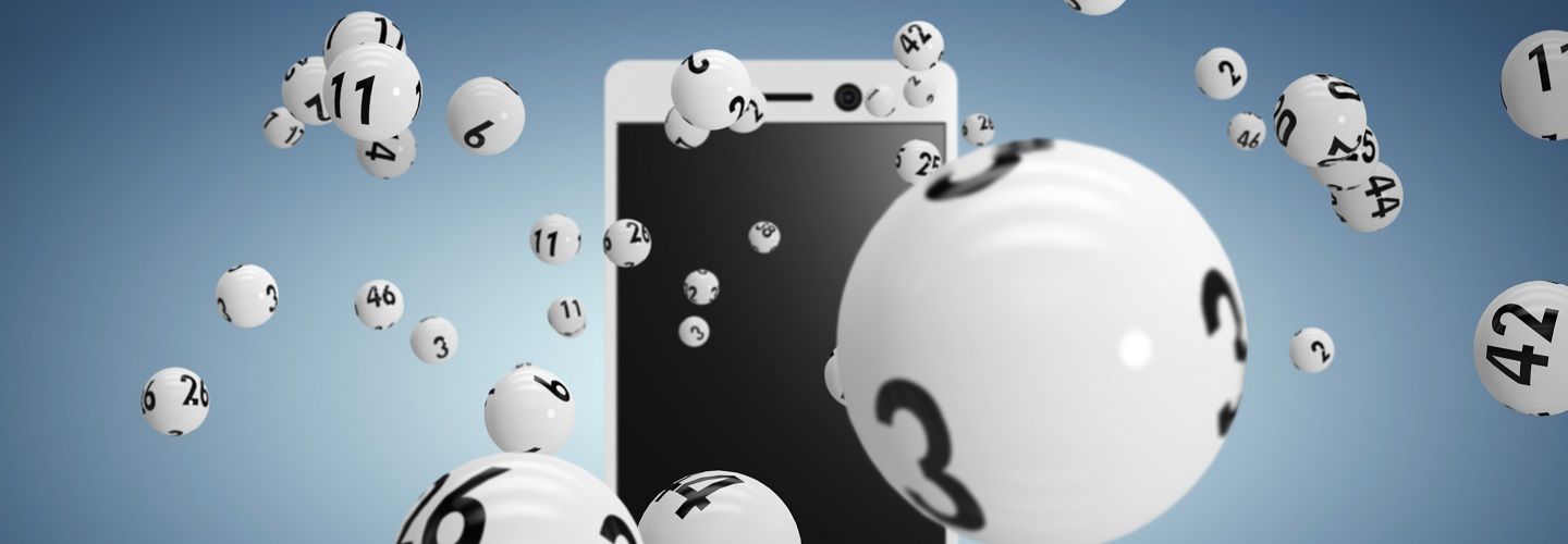 Image of lotto balls bouncing in front of a mobile phone