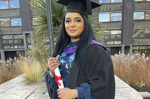 MA Internation Politics and Human Rights student Dalia Hussain standing for a picture at graduation ceremony