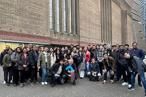Students stand outside the Tate Modern